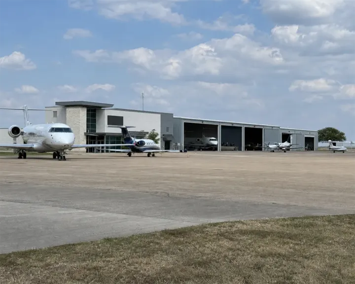 Business jets on the apron at an FBO campus