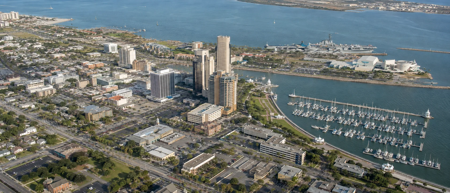 Aerial view of downtown Corpus Christi, Texas, with the bayfront marina and Corpus Christi Bay