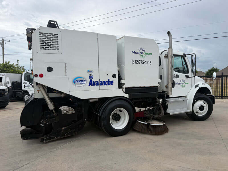 Moore Clean Avalanche M6 regenerative air sweeper on route